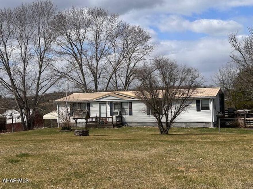 Enjoy the country views from this simple yet comfy home. Conveniently located in the country just off of I70. This home offers a spacious floor plan and a great basement with an integral  oversized two car garage. Close to an abundant amount of outdoor recreation, restaurants and shopping. Priced to sell....