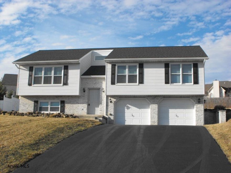 Top to bottom like brand new - seller had energy audit in 2011 and has worked on updates for 4 years.  New roof and skylights, central air and windows.  Most recently has fresh paint and flooring throughout.  New stainless steel appliances.  1st floor laundry.  Open and airy lower level has family room with gas fireplace and 1/2 bath.