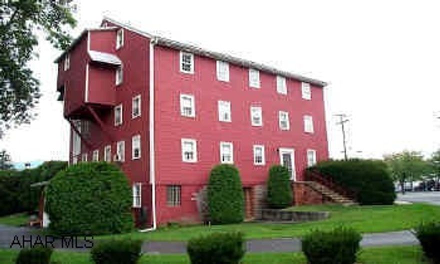 Character galore! Once an old mill, this building was lovingly restored to be used a home/home business set up. First floor features large LR, DR, kitchen, BR w/bath, TV Room and also business space that can be easily made into family rooms. 2nd floor features 4BR's(2 w/WIC), full bath, family room area and large office (could be 5th BR) and cedar closet. 3rd floor was used for woodworking shop and is open (measures 43x48 and can be made into many rooms) also features its own electric furnace for heat. 4th floor is attic/storage area. This property can be used for single family residence, home/home office-business or made into several apartments. A must see home on majestic 3.5 acres +/- with 200 feet of river frontage. Truly a must see!! Follow Main Street in Alexandria to Mead, see property on left.