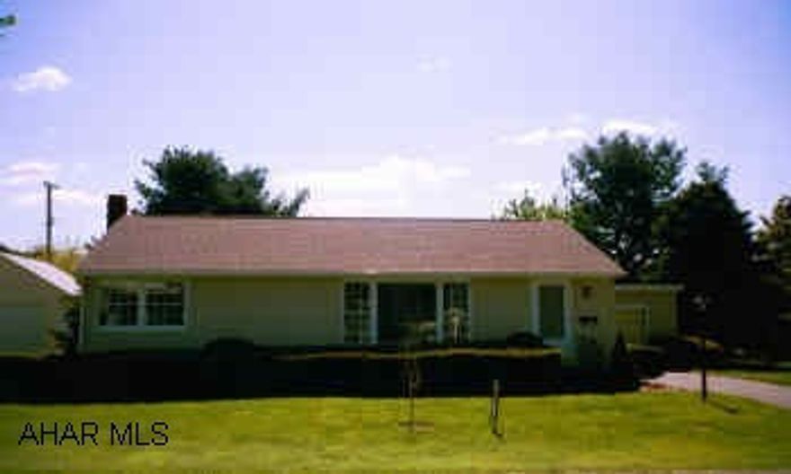 1 story ranch with tan vinly siding.  Hidden beauty on secluded street. Nice ranch on level lot with hardwood floors and new kitchen. Blown insulation all added within last 6 months.