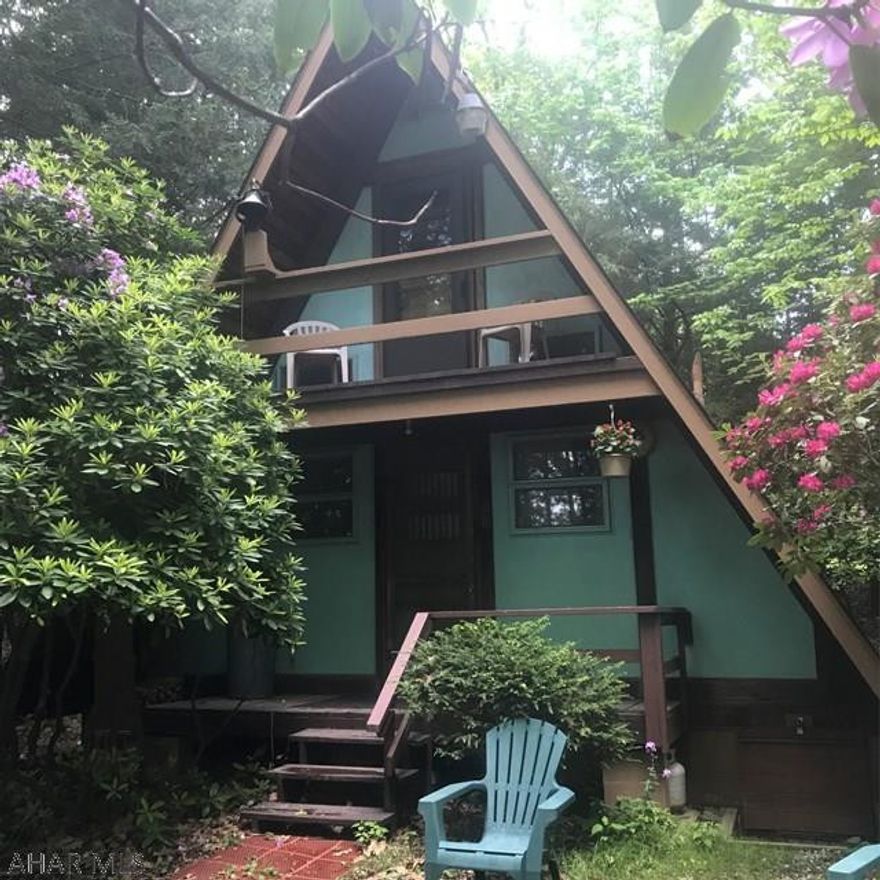 Great summer or yearound cottage!  Lovely A-frame home in quiet setting on 5 acres with mature trees.  Hiking trails. Acreage is broken down into 5-1 acre lots. Same owner for over 25 years. Storage sheds and picnic pavilion with brick fireplace/grill. Close to Glendale lake and State Game Lands. Call for more info!