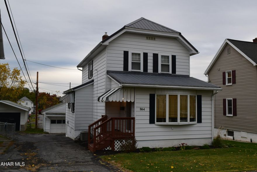 This spacious two bedroom home has been nicely updated and is move in ready. It has a detached garage and is conveniently located within minutes to everything. The basement is partially finished with a TV room and a half bath. The enclosed back porch adds additional living space and overlooks the fenced in back yard.