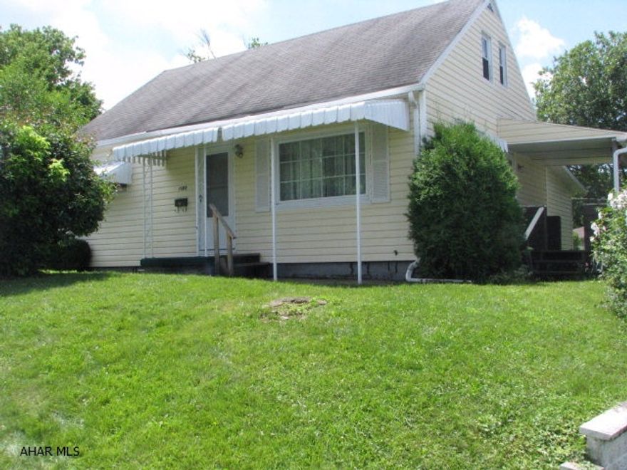 Cozy yet spacious home on three lots in quiet, desirable neighborhood.  Does it need some updates?  Sure, but you have a great canvas to do those updates on. There is a newer furnace and central air conditioning unit. The original beautiful hardwood floors on first floor are already there for you. A spacious family room just off the kitchen is a real bonus. With this being on three lots there is plenty of room for a pool or large deck for entertaining. We all love that outdoor space!