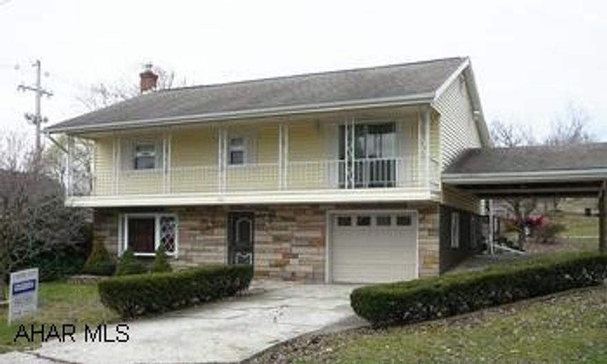 Very nice raised ranch with 4 bedroom, 2 bathroom, open kitchen, dining, and living area.  Fenced yard, deck. Two gas fireplaces. One car garage and one car carport.Two heat sources. L-Shaped lot. Very nice raised ranch with 4 bedroom, 2 bathroom, open kitchen, dining, and living area.  Fenced yard, deck. Two gas fireplaces. One car garage and one car carport.Two heat sources. L-Shaped lot.