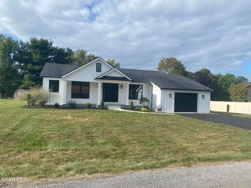 Welcome to Antis Township living! This beautifully updated 3-bedroom, 2-bath home sits on a spacious lot in one of the area's most desirable locations. Every detail has been redone - brand new roof, siding, windows and so much more. Inside, you'll love the modern kitchen with sleek quartz countertops, new cabinetry, and stainless-steel appliances. Both bathrooms have been tastefully remodeled and new flooring flows throughout the home for a move-in-ready feel. Natural light fills every room, especially the oversized enclosed sunroom - perfect for relaxing or entertaining year-round. With plenty of outdoor space and a bright, open interior, this home combines comfort, style and convenience all in one.