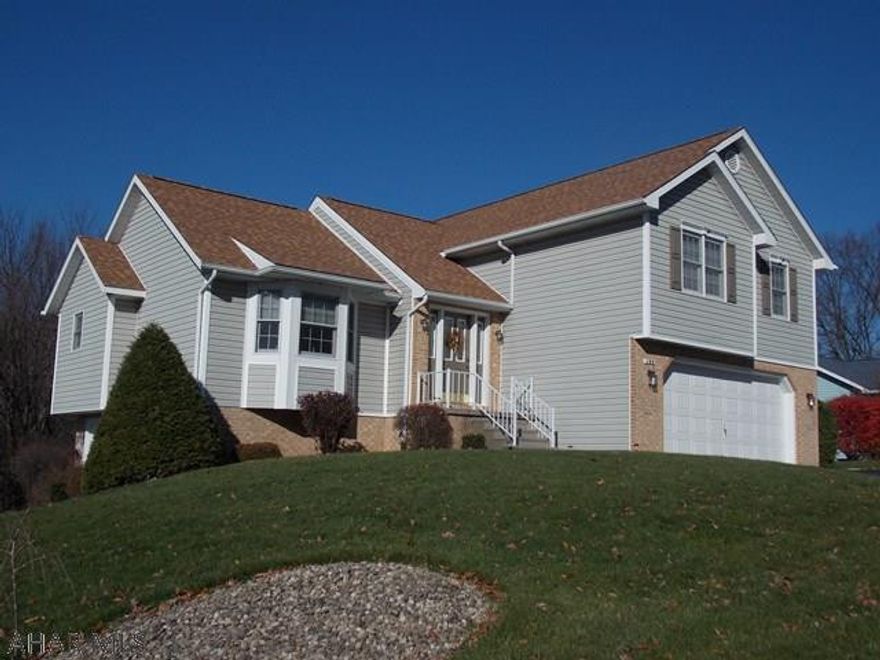 Working in State College or Altoona, this house is located close to I 99 for an easy commute. Meticulous inside and out with tons of living and storage space. Two of the 3 bedrooms have walk-in closets, the other has 2 closets. With two family room areas there is plenty of room for the kids to play. The family room with the fireplace is a cozy place to watch TV on those cold winter nights. The garage has both heat and AC to work on cars. The driveway is extra wide and offers extra parking. Call today for a chance to own this lovely home. Brand new roof in 2016!