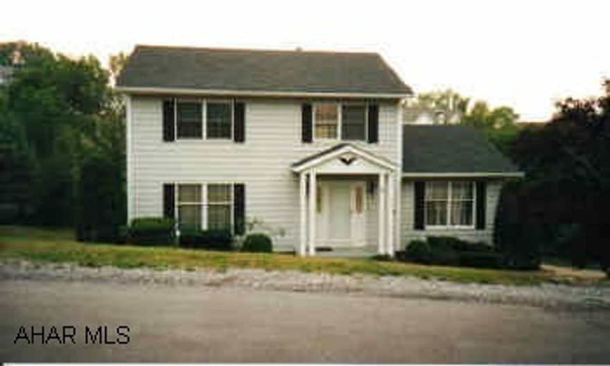 2 story Colonial 4BR, 2.5BA, 1st floor family room with woodburner and family room in basement.  Price reduced.  Movtivated seller.  2 family rooms!  central air.