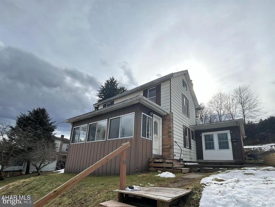 Welcome to your new home in Philipsburg! This charming and affordable 3-bedroom, 1-bathroom abode is the epitome of provides comfort and convenience. As you step inside, you'll be greeted by an enclosed front porch, perfect for relaxing and soaking in the scenic views of the neighborhood. The spacious living room boasts fresh, new luxury vinyl flooring and then presents new carpeting that extends throughout the upper level, creating a cozy atmosphere for gatherings with family and friends. Adjacent to the living room is a functional eat-in kitchen, offering ample space for cooking and dining, along with a convenient mudroom area for added storage and organization. On the first floor, you'll find a convenient bedroom, providing flexibility and ease of access. As you make your way upstairs, two additional bedrooms await, providing plenty of space for everyone in the household. Why rent when you can own a home? With affordable pricing and all the comforts of homeownership, now is the perfect time to make the transition from renting to owning. Don't miss out on the opportunity to invest in your future and build equity in a property that you can truly call your own. Whether you're enjoying the enclosed porch with a bird's eye view of Philipsburg or embracing the comfort of the spacious living areas, this home offers the perfect blend of affordability and functionality. Schedule a viewing today and start envisioning the possibilities of life in your new home! This offering also includes a 1 bed, 1 bath apartment providing some passive income and security.