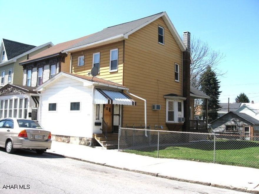 2BR, 1 bath on double lot with detached garage. Large eat-in kitchen with laundry area.