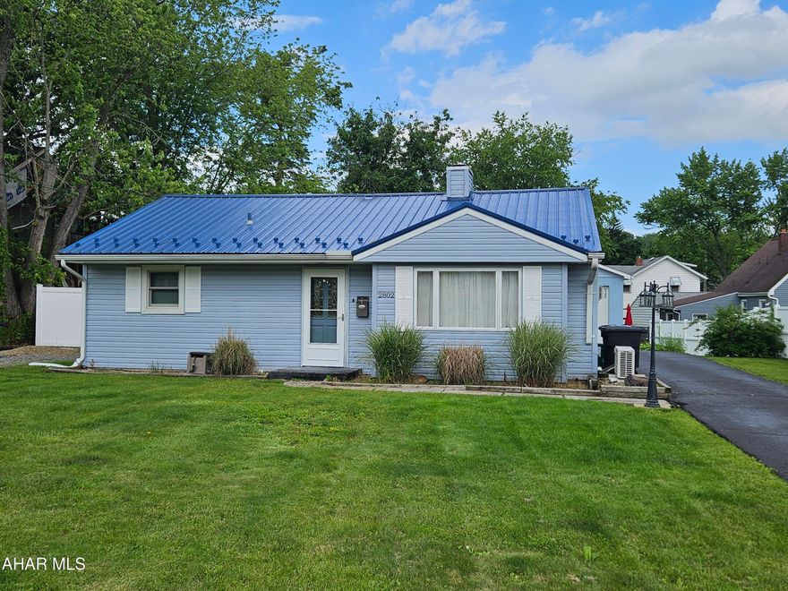 Charming and well-maintained one-story home, perfect for comfortable one level living. Featuring 2 bedrooms and 1 full bath, this home offers a smart, efficient layout that maximizes every square foot. The inviting family room addition provides extra space for relaxing or entertaining, seamlessly connected to the outdoor areas such as the screened, private patio.

Step outside to enjoy a large, fully fenced backyard—ideal for kids, pets, gardening, or outdoor gatherings. The  2-car garage offers excellent storage and workshop while the paved driveway adds convenience and plenty of parking space.