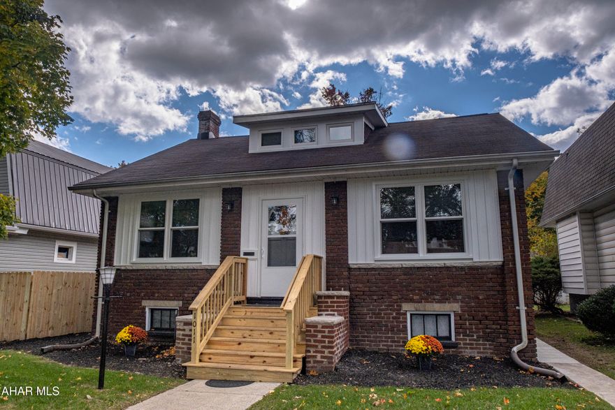 Discover this beautifully updated gem brimming with character and charm! The living room boasts a stunning brick fireplace and intricate woodwork, creating a warm and inviting atmosphere.

On the main floor, you'll find two cozy bedrooms connected by a convenient Jack-and-Jill bath. Upstairs offers a private third bedroom with its own full bath—perfect for guests or a primary suite!

The freshly painted basement provides plenty of possibilities, featuring a laundry area, ample space for a workout zone or game room, and yet another full bathroom.

Step outside to enjoy the beautiful covered deck, perfect for relaxing or entertaining. Plus, the property includes a garage for added convenience!

This home offers the perfect blend of modern updates and timeless charm. Check out our Matterport 3D Virtual Tour and schedule your tour today!