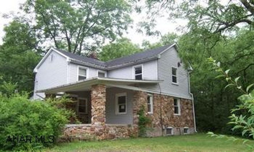 Property being sold AS IS. Buyer must pay both transfer taxes. Property has encroachment issue. Call listing agent for info.