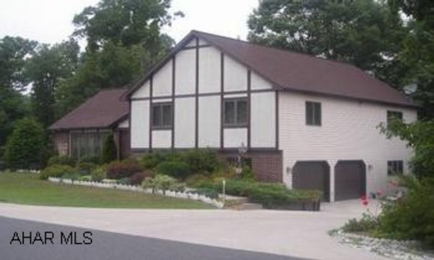 SELLER WILL CONSIDER LEASE WITH OPTION TO PURCHASE, CALL TINA FOR DETAILS. SPACIOUS 4 LEVEL SPLIT WITH INLAW SUITE IN LAKEWOOD MANOR!THERE IS A LONG LIST OF AMENITIES WITH THIS ATTRACTIVE HOME!  THE OPEN FOYER WELCOMES YOU TO THE MAIN FLOOR OFFERING FORMAL LIVING AND DINING ROOMS THAT EXIT TO A WINDOW-WRAPPED SUNROOM!  THE QUALITY KITCHEN WITH PERGO FLOORING HAS BUILT-IN APPLIANCES.   THERE ARE THREE BEDROOMS UPSTAIRS INCLUDING THE MASTER SUITE WITH A PRIVATE FULL BATH AND WALK-IN CLOSETS.   THE LOWER LEVEL HAS A 23' X 15' FAMILY ROOM WITH ACCESS TO THE TWO-TIER DECK AND PATIO!  THE LOWER LEVEL HAS A COMPLETE SUITE WITH A KITCHENETTE, LIVING AND DINING AREAS, FULL BATH, BEDROOM, AND EVEN A PRIVATE GARAGE ENTRANCE!  PLUS ANDERSEN DOUBLE PANE WINDOWS, A NEWER CONCRETE DRIVE WITH AN EXTENDED APRON, NEWER CENTRAL AIR, PERENNIAL GARDENS, MATURE TREES AND TREMENDOUS STORAGE!  A TOTAL OF 4 BEDROOMS AND 3 FULL BATHS.  THIS HOME HAS BEEN LOVINGLY MAINTAINED AND IMPROVED!  CALL TINA TODAY TO SEE!