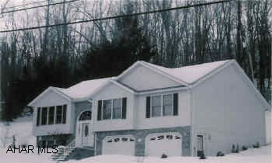 Raised Ranch in Excellent condition. Freshly painted interior, new front door, new 18x16 patio, new landscaping.