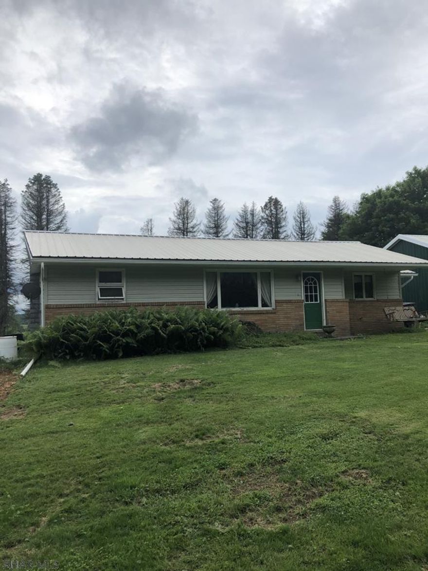Cambria Twp -1 story 3BR brick & vinyl sided ranch home on 1.2 acres. Oil HW heat. Central air, well and septic. 3 car detached garage.