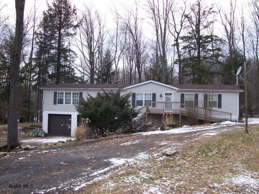 Lovely spacious 3 bedroom, 2.5 bath 1994 doublewide on large lot.  Beautiful stone fireplace plus wood burner, open floor plan, jaqcuzzi tub, 3 year old roof, all appliances, this is a nice property!