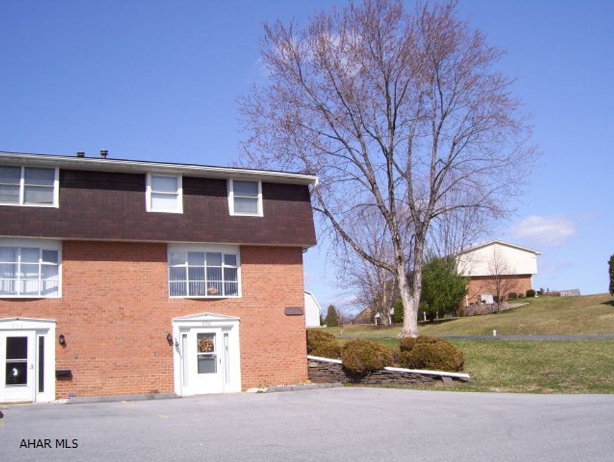 Fantastic 3 bedroom, 1.5 bath townhouse with finished basement. Well maintained end unit in Bldg. J.  $140/mo. Association fee includes roof, outside building maintenance, grass cutting, snow plowing, swimming pool use, trash removal, fire insurance on outside of building. All appliances and window treatments included.