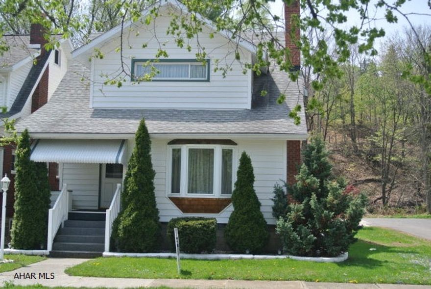 Very clean, well maintained home. New  windows, hardwood floors (except for addition in LR), kitchen has Corian countertops, breakfast area, bow windows in LR & DR, 2 closets-large in largest bedroom, 2nd floor bath was re-done. Sun porch enclosed off 1 bedroom. Good mechanics. Basement is carpeted.