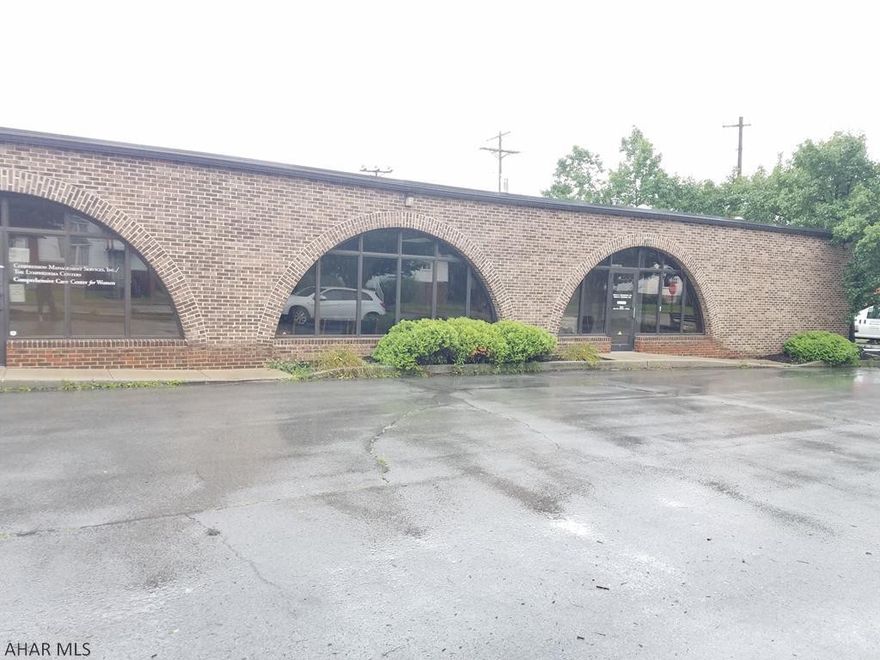 If you can dream of something to put into this building, you could make it work! This Altoona office is split into 2 units.  One unit is occupied by a long term tenant, the larger unit is available for lease.  This building was constructed with the highest quality workmanship and is an ideal building with so many possibilities!