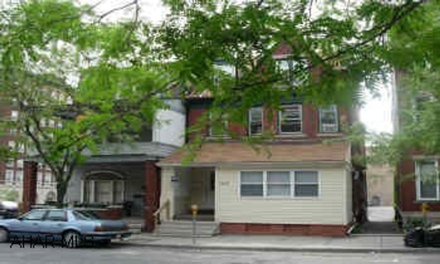 TWO UNITS. LARGE & IN GREAT CONDITION. SEP. HEAT. LARGE UNITS IN EXCELLENT CONDITION. EACH UNIT IS RENTED. OFF STREET PARKING. SEPARATE HEAT.