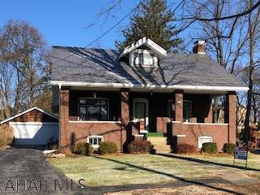 This large classic craftsman house is waiting for your personal touch.  Get cozy by the wood burning fireplace in the large living room with hardwood flooring, spacious dining room with window nook, kitchen is large and features a walk in pantry.  There are two nice sized bedrooms and a full bath that complete the first floor.  Second floor has hardwood flooring and has a generous bonus room that you could use as a family room, playroom or bedroom, an additional bedroom and full bath complete this level.  Newer electric, new roof on house and garage in 2014.  Relax in the evenings on your large covered porch or entertain family on the covered deck.  So many unique features, built ins, and closets that you don't find in a typical home. Property is being pulled from the flood plain!!!