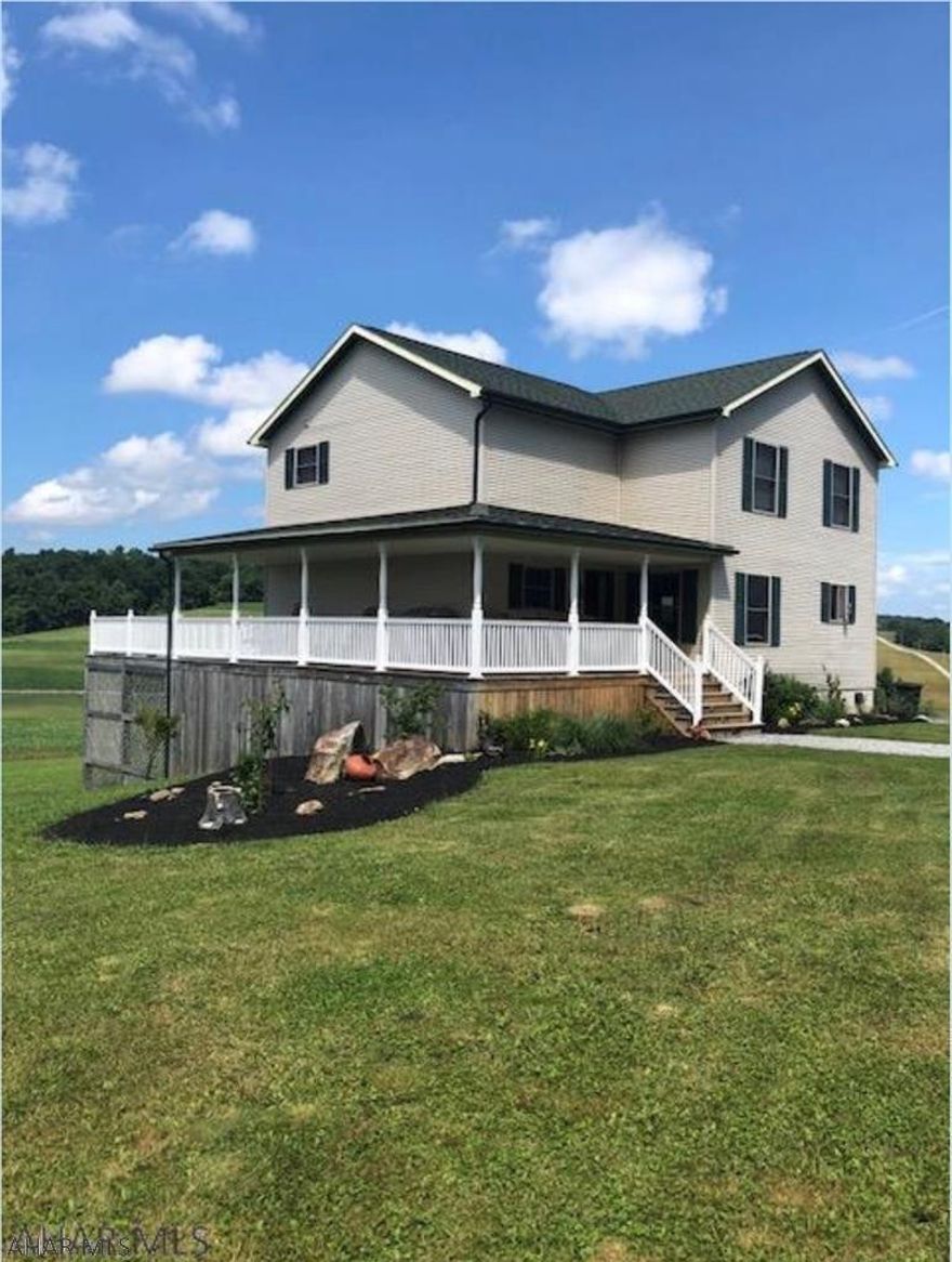 ACREAGE! ONE OF A KIND! This prestigious custom built home located on 17.3 acres,40 minutes from Altoona! Remarkable location with breathtaking views, this 4BR/2BA home is move in ready with many custom upgrades. Second story x-large master suite with 2 person jacuzzi and huge WIC! Main level boasts a beautiful KIT and LR with an open floor plan along with full BA and guest BR, all with access to the wrap around deck. Basement includes very large mudroom/laundry room, 2 BRs each with walkout access, area plumbed for a third BA and a large unfinished space great as a workout area!  Cabin/shooting range in a private area for hunting/shooting/outdoorsman enthusiast. A must see!