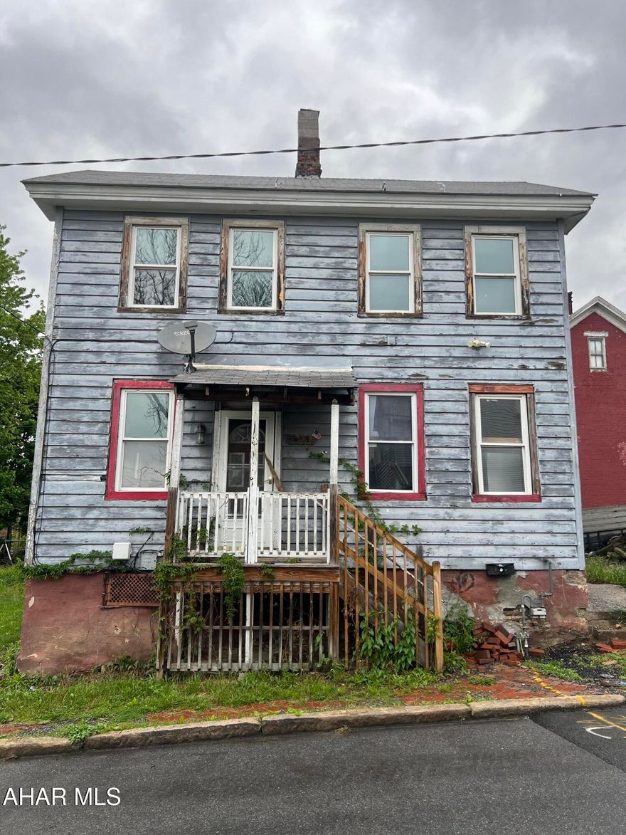 Calling all investors! This home features 3 city lots!  Offering strong potential for investors or flippers. Home will require renovations and updates throughout and is being sold in its current condition.  Call to schedule your private showing.