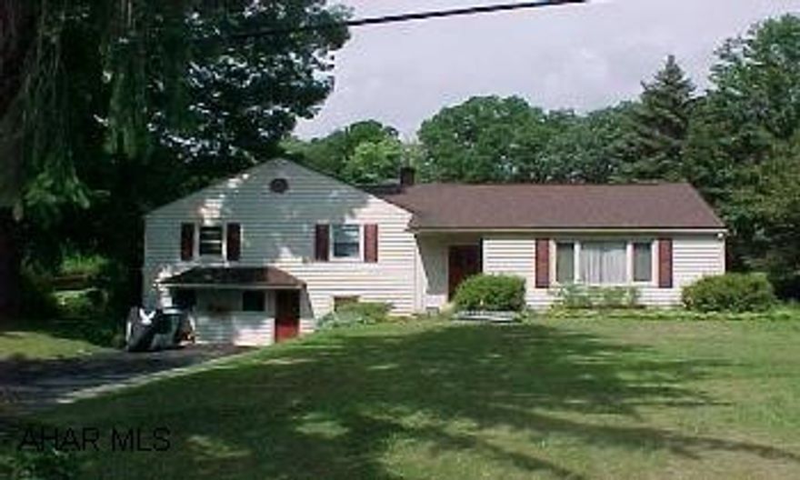 Multi Level Home, hardwood flooring, central air, new carpeting, two bonus rooms, hobby room in basement. Great location, large lot. Survey in office.