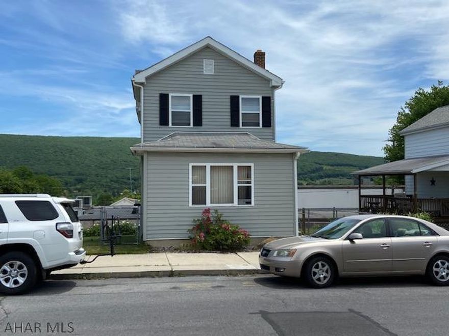 Nicely remodeled two story on a double lot. Modern kitchen, drywalled walls and ceilings, thermopane windows, coal/wood burner in addition to the gas heat. Very nice home for the $$.