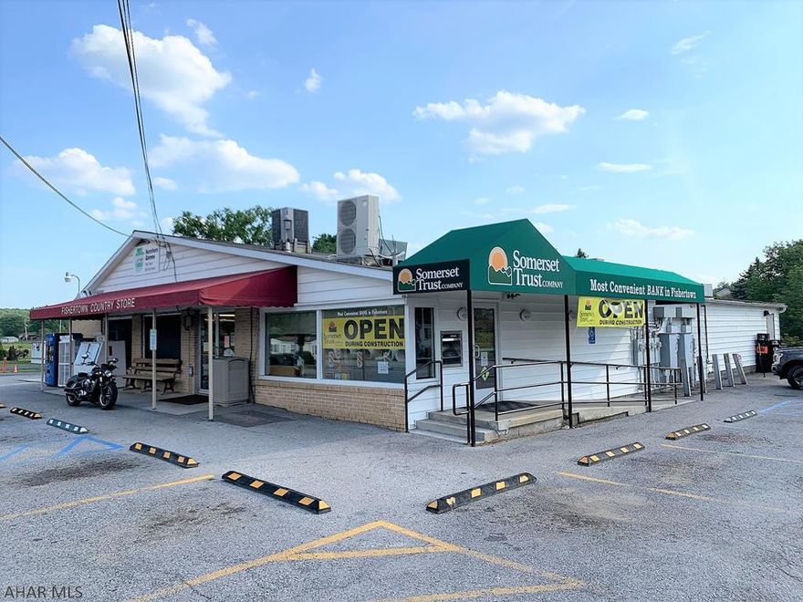 Long operating, busy, and very well established turn key business opportunity!! There is an operating grocery market known as the Fishertown Country Store, a newer laundromat (Seller Owned), and long term bank tenant. The building contains approximately 6,572 square feet, offers an owner residence or could be an additional rental, and rests on a full basement. Great corner location along Busy State Route 56 with excellent visibility and exposure and a large parking lot to accommodate customer demand. This is a well maintained property and a well run operation. Unique chance to own a business with vast potential!!