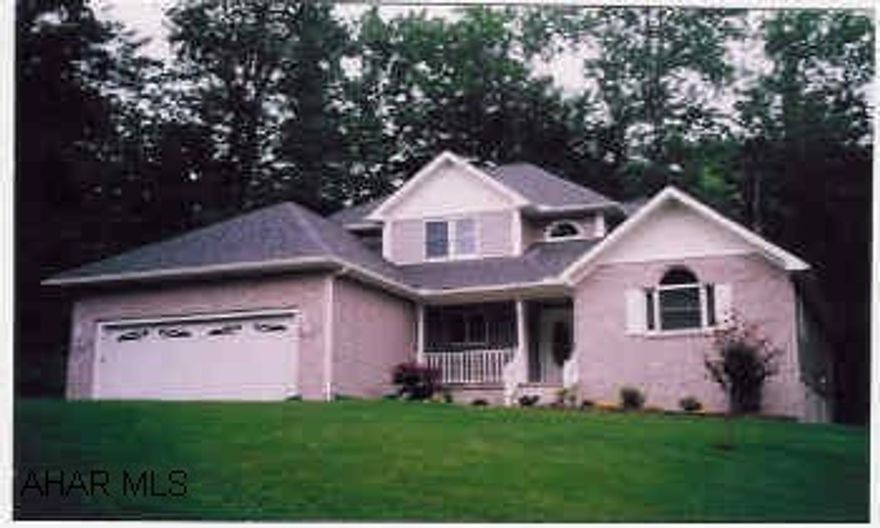 Nearly new contemporary home in premier development.