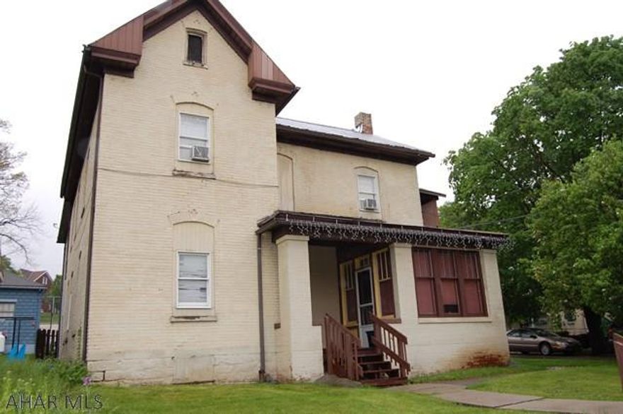 Large 2 story brick rental property.  Located one block from the Garver YMCA.  (4 rental units- all occupied) Rents totals- 1756/mo. Owner pays- water/sewer, gas. Tenants pay electric and garbage.