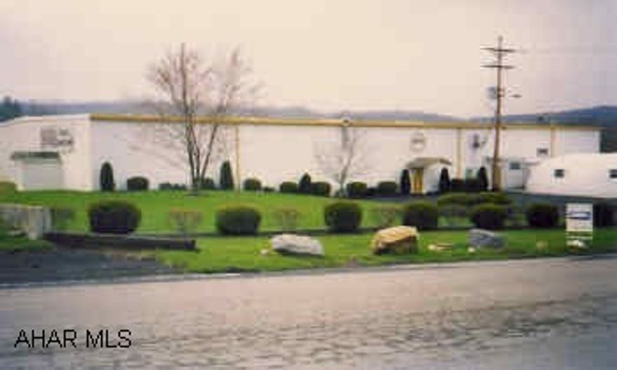 Warehouse, mostly new consturction. 20,500 sq ft old construction, 45,000 sq ft built in 2001. 6 loading docks, large lot. City water/sewer, 6 loading docks, 3 phase electric, office space, concrete floor, insulated walls andceilings, adequate lighting.