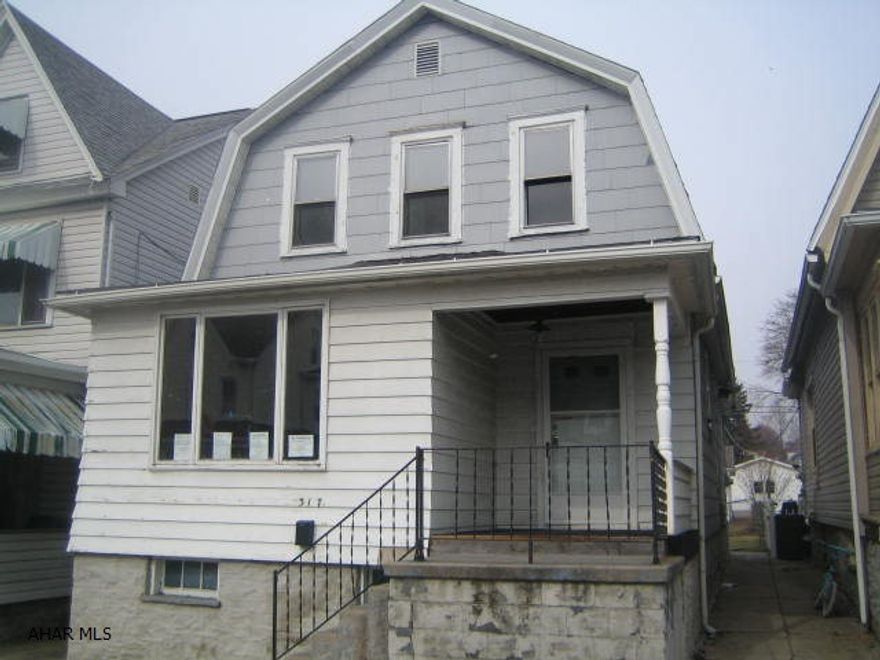 Juniata 2 Story in need of TLC. 2 bedrooms, living room, formal dining room, 2 enclosed porches and off-street parking. Buyer pays both transfer taxes.