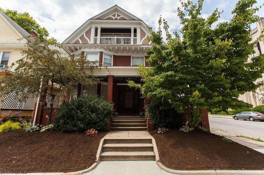 Beautiful 4 bedroom house with lots of charm. Hardwood floors, build in china cabinet in the dining room, and large front porch with swing. Fenced in backyard and off-street parking. This house is very affordable due to the third floor, tenant occupied, apartment.