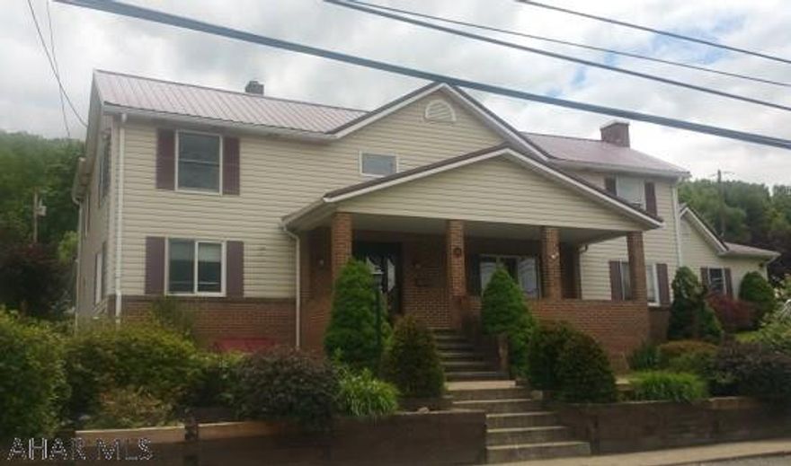 spacious 2 story- oversized detached garage, Property was built prior to 1978 and lead based paint potentially exits.