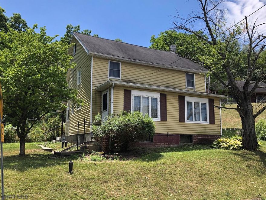 East Freedom 2 bedroom, 1.5 bathroom home. Currently used as an investment property with a long term tenant. Kitchen has an eat-in area, main floor laundry with 1/2 bath. Off street parking with central air. Garage needs TLC or removed.