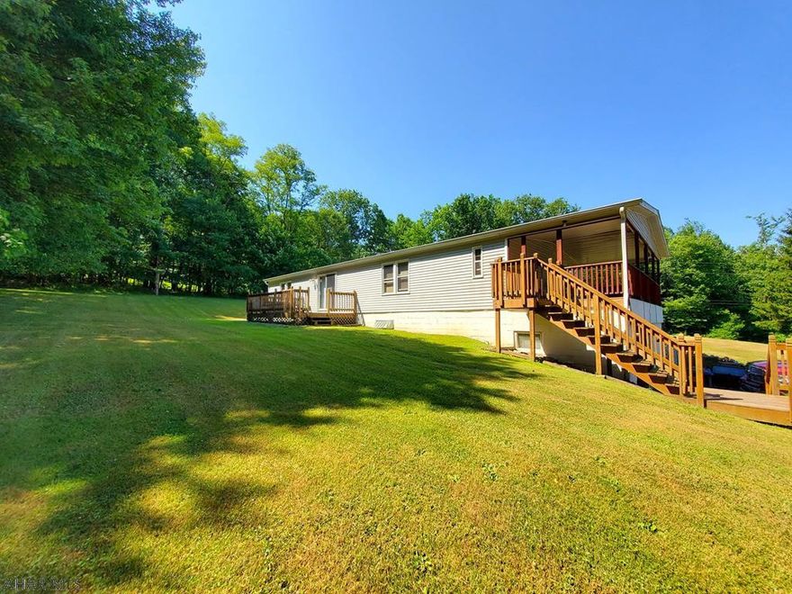 Beautiful 3 bedroom 3 bath home located on 5+ acres!  If you are looking for peaceful country living, look no further! This spacious home features not only 3 garage stalls, an apple orchard, and a relaxing area nestled in the woods for building fires and having a picnic in your own backyard! Schedule your private tour today! (Pre approval needed for showings) Buyer to confirm taxes, sq footage and lot size.