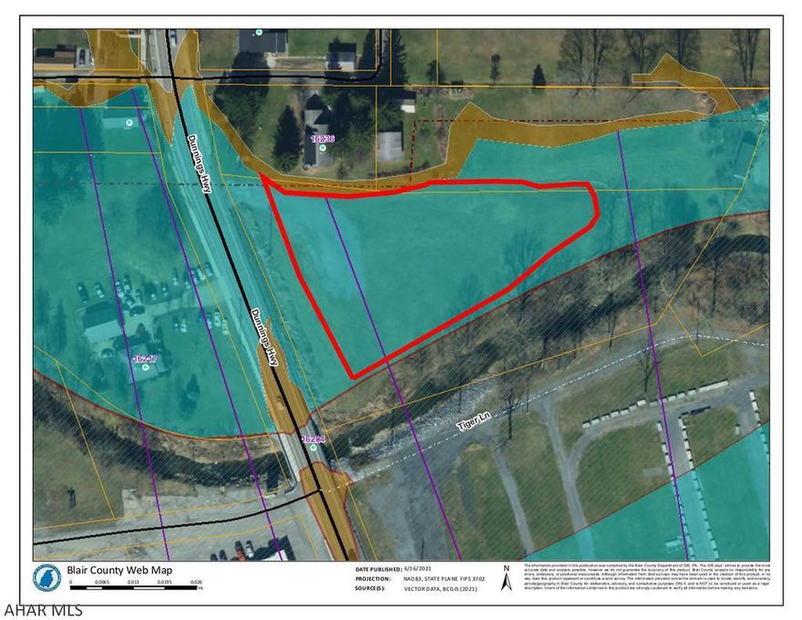Busy commercial corridor beside the flea market and across from the farm market in East Freedom. 2.3 Acres with over 1 acre now out of the flood zone. We obtained a letter of map amendment (LOMA) so that you have buildable area outside of the flood zone. See attached map.