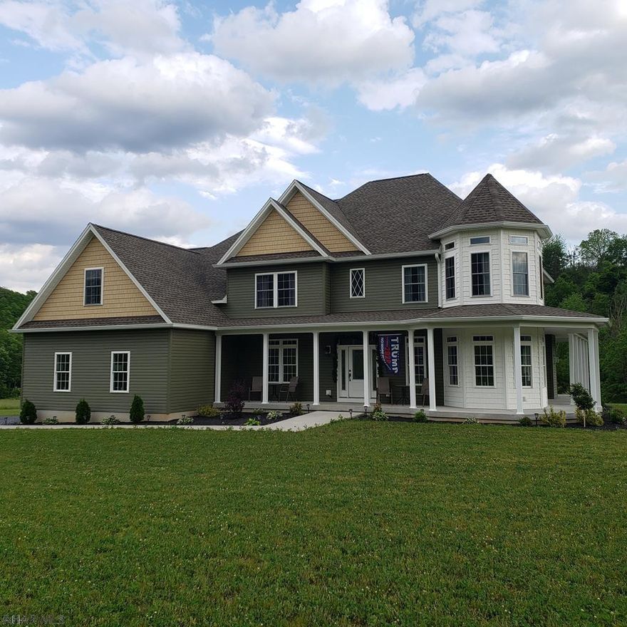 Stunning custom built home in Scotch Valley. This home was built with every detail in mind. Beautiful real Hickory Hardwood flooring  throughout the home, custom blinds, custom kitchen cabinets, granite countertops, wine refrigerator, floor to ceiling stone fireplace, and 2 Bosch high efficiency heat pumps. The first floor feautures an open floor plan along with a formal dining room, first floor bedroom, 3/4 bath, and private study with french doors. The second floor offers two large bedrooms, full bathroom with double sinks and recreation room. The master suite is impressive with a HUGE walk in closet, 6 foot jetted tub with mounted tv, tile flooring double sink and granite. This home sits on just under 3 acres, with heated, attached, oversized 2 car garage & 1 car detached garage.