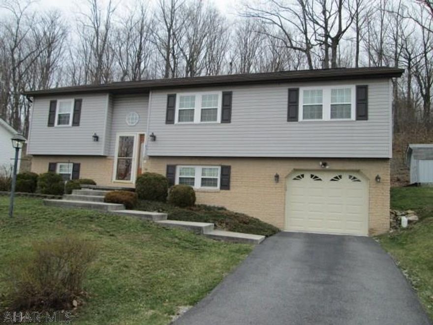 Immaculate bi level on quiet cul de sac. This home has been updated throughout. Upgraded kitchen with Quartz counter top, tile floors, newer flooring throughout and newer windows. Lower level has wet bar & TV area. This one is a must see.