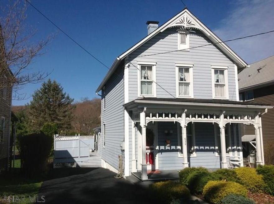 Three bedroom , two full baths Victorian style home in immaculate condition. This home with its decorative touches is a must see. Located on a spacious lot and a very desirable area.Newly updated kitchen and mud room.  Hot tub installed summer 2016.