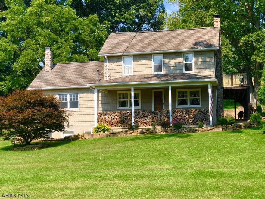 Secluded homesite w/ convenient access to downtown Bedford & shopping. This circa 1920 farmhouse has been updated by licensed/bonded contractors to reflect a modern country charm. Granite countertops, high end appliances, central air, and 3 heat sources ensure comfort year-round.  2.8 miles from state game lands. A 3 bay garage w/ loft & garden sheds ensure bountiful room for recreational equipment & hobby enthusiasts. Wrap around porch adds value and enjoyment at gatherings of family and friends.  Landscaped yard allows children & pets room to roam. Nestled between Evitts and Tussey Mtns, this home offers views seldom seen. Pre-sale home inspection available. Custom woodwork thru-out, including reclaimed barn siding, Southern Yellow Pine and Western Red Cedar trim & staircase. Come & See!