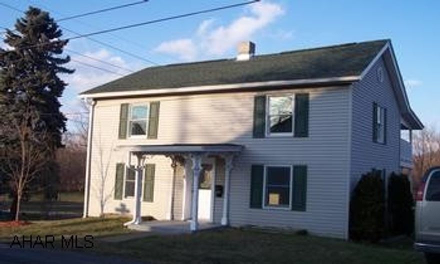 remodeled vinyl sided two story 3 bedroom  house with large yard on corner lot and shed. 3 bedroom house remodeled with new roof, new appliances including first floor laundry with washer and dryer, new fixtures, new carpet, laminate flooring, and spouting, blown in insulation, two story porch, anderson windows, full unfinished basement.