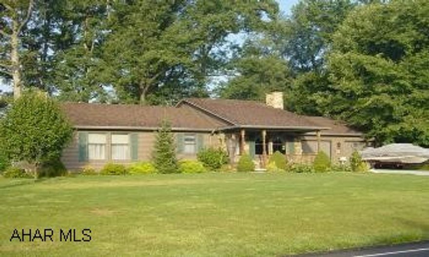 Spacious rural ranch home. Many features, oak kitchen, vaulted ceilings, two family rooms, large laundry room, large 21/2 car attached garage, shed with electricity,  lovely back yard with pond, concrete driveway,  large basement storage room. This three bedroom ranch has three baths, two family rooms, great back yard with pond, shed with electricity, 2 1/2 car attached garage, concrete driveway, central air, great large laundry room, woodburner, great shelved  storage/utility room, oak kitchen. Immaculate condition!   Possible delayed possession, kitchen corner cupboard excluded.