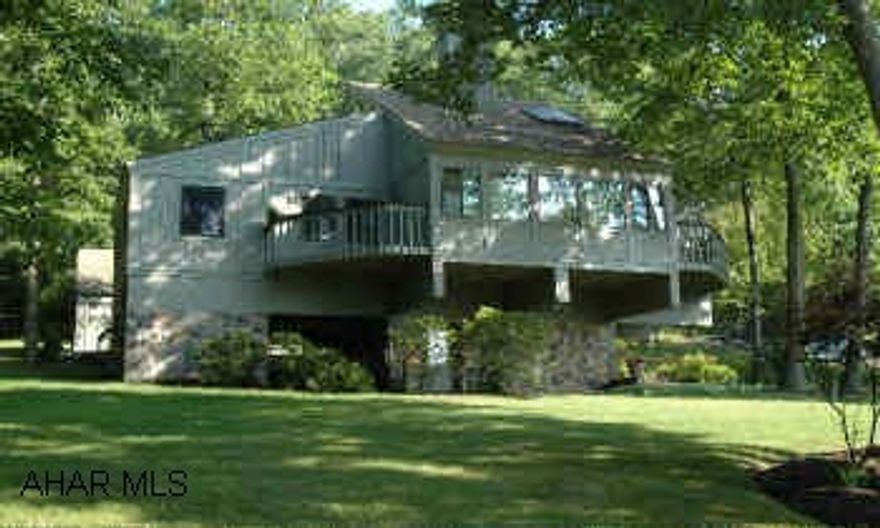 FROM BEDFORD, PA. SOUTH ON BUSINESS 220 PAST THE BEDFORD SPRINGS HOTEL AND GOLF COURSE.  LOOK FOR CONDO DRIVE AND PROPERTY ON THE RIGHT THIS ONE OF A KIND PROPERTY ACROSS FROM THE BEDFORD SPRINGS GOLF COURSE OFFERS EXCEPTIONAL CONSTRUCTION WITH 4 BEDROOMS, 5 BATHS, TWO FIREPLACES AND A KITCHEN WITH ALL APPLIANCES. HOME WARRANTY IN PLACE. FROM BEDFORD, PA. SOUTH ON BUSINESS 220 PAST THE BEDFORD SPRINGS HOTEL AND GOLF COURSE LOOK FOR CONDO DRIVE AND THE PROPERTY ON THE RIGHT