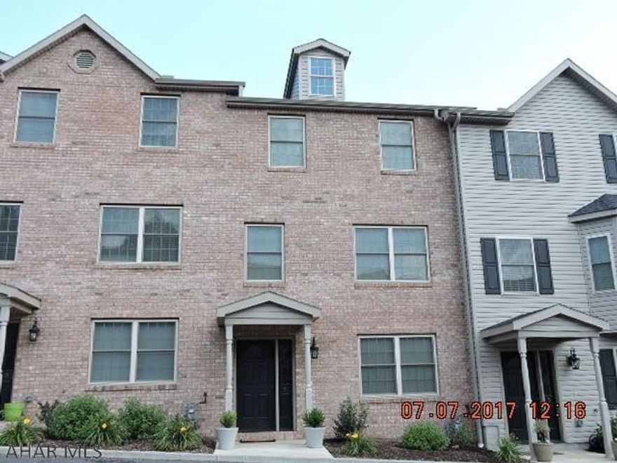 Better than new townhouse only a year old with year old appliances.  Seller has installed custom blinds throughout and installed a very pretty glass backsplash in the kitchen.  It still has that new house smell!  These units sold quickly when new  so this will go quickly.  Granite counters in kitchen & master bath.  Hardwood & ceramic tile floors.    Please remove shoes.  Square footage based on county tax records