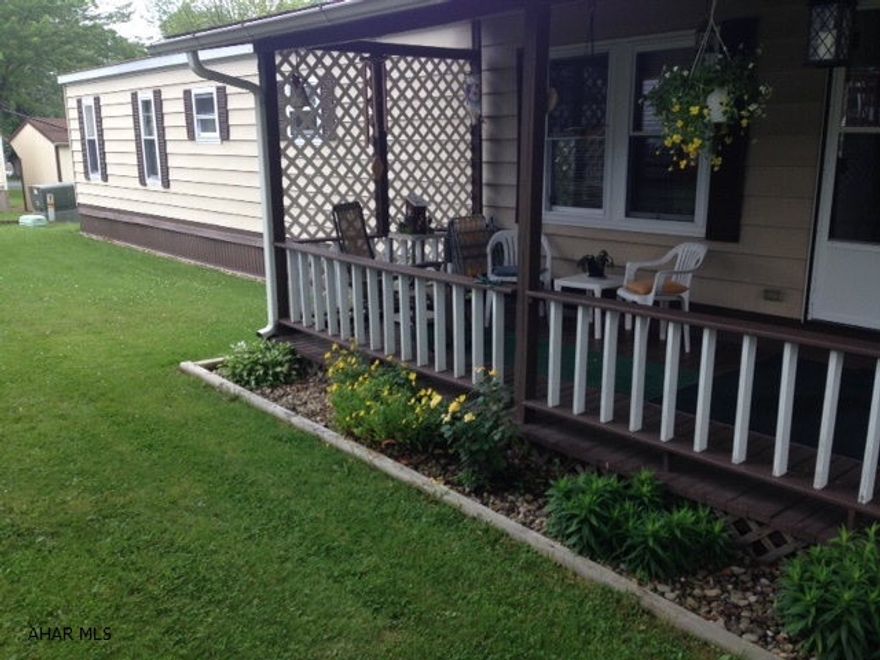 14 x 70 Marlette singlewide in beautiful condition. Open concept living room and kitchen. 2 bedrooms and 1 full bath. Relaxing covered porch, outbuilding. Well maintained and move-in ready!