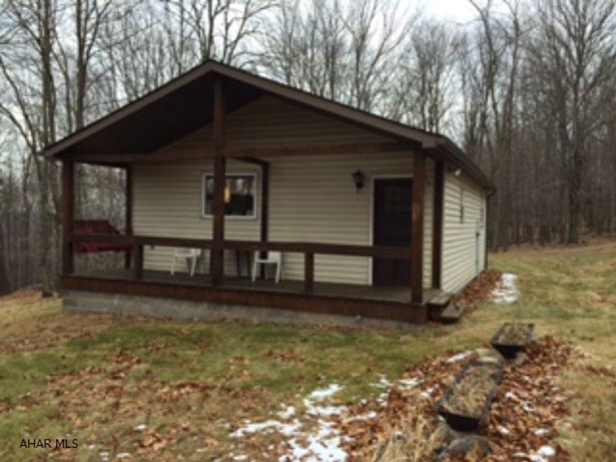 Mountian Top Retreat - Perfect for hunting cabin and only 30 (+/-) minutes from Blue Knob Ski Resort!! Get away from it all!! Lovely private 2 bedroom cabin on 30.965 acres. Enjoy the wildlife, Deer, Turkey, and Bear. Don't wait on this one!! New roof in 2006, 36 x 24, 2 bedroom recreational cabin. ***Property is winterized*** woodstove and portable electric heaters are only heat source.