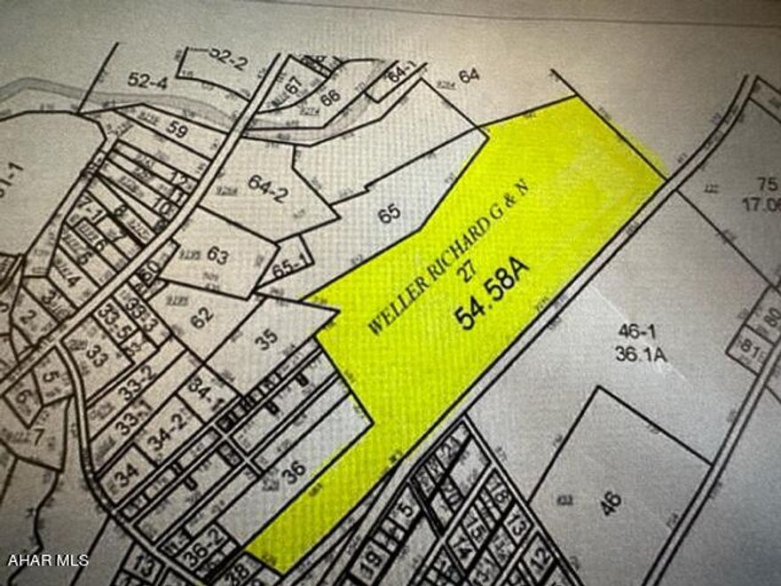 Large parcel of land near Brooks Boulevard. Property is used for recreation presently. No improvements to the land. Property is in Clean and Green.